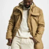 Brandit Herren Parka Marsh Lake Teddy In Beige -Modisches Herrenbekleidungs Geschäft brandit parka beige 935783