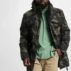 Brandit Herren Parka Marsh Lake Teddy In Camouflage -Modisches Herrenbekleidungs Geschäft brandit parka camouflage 935784