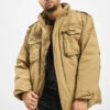 Brandit Herren Winterjacke M65 Standard In Beige -Modisches Herrenbekleidungs Geschäft brandit winterjacke beige 720108