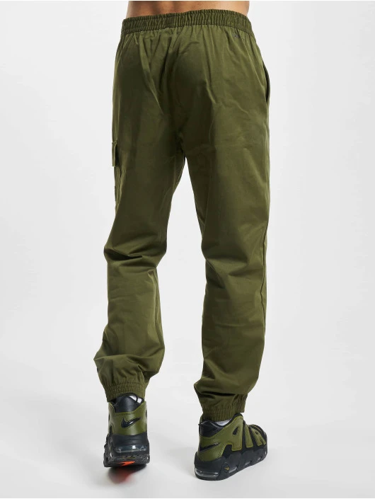 Herren Jogginghose Woven in grün Nike Herren Jogginghose Woven In Grün -Modisches Herrenbekleidungs Geschäft nike jogginghose gruen 975011 1