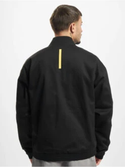 Puma Herren Bomberjacke NJR In Schwarz -Modisches Herrenbekleidungs Geschäft puma bomberjacke schwarz 831147 1