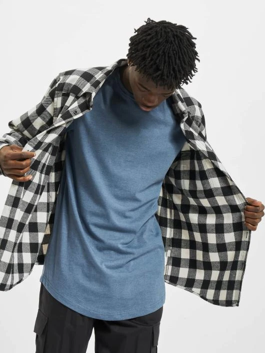 Herren T-Shirt Shaped Melange Oversized Long in blau URBAN CLASSICS Herren T-Shirt Shaped Melange Oversized Long In Blau -Modisches Herrenbekleidungs Geschäft urban classics t shirt blau 399976